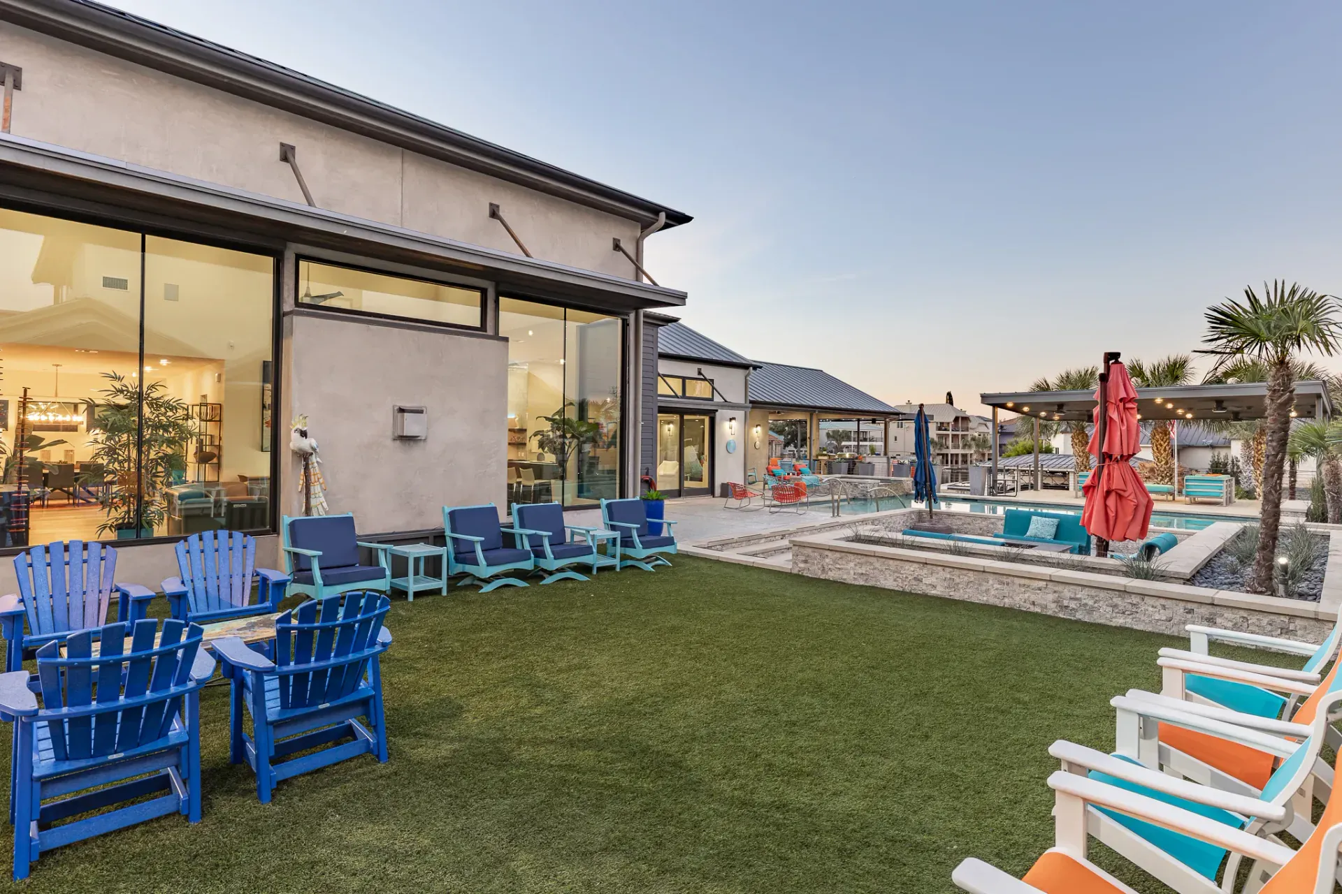 Backyard with Adirondack seating and pool view